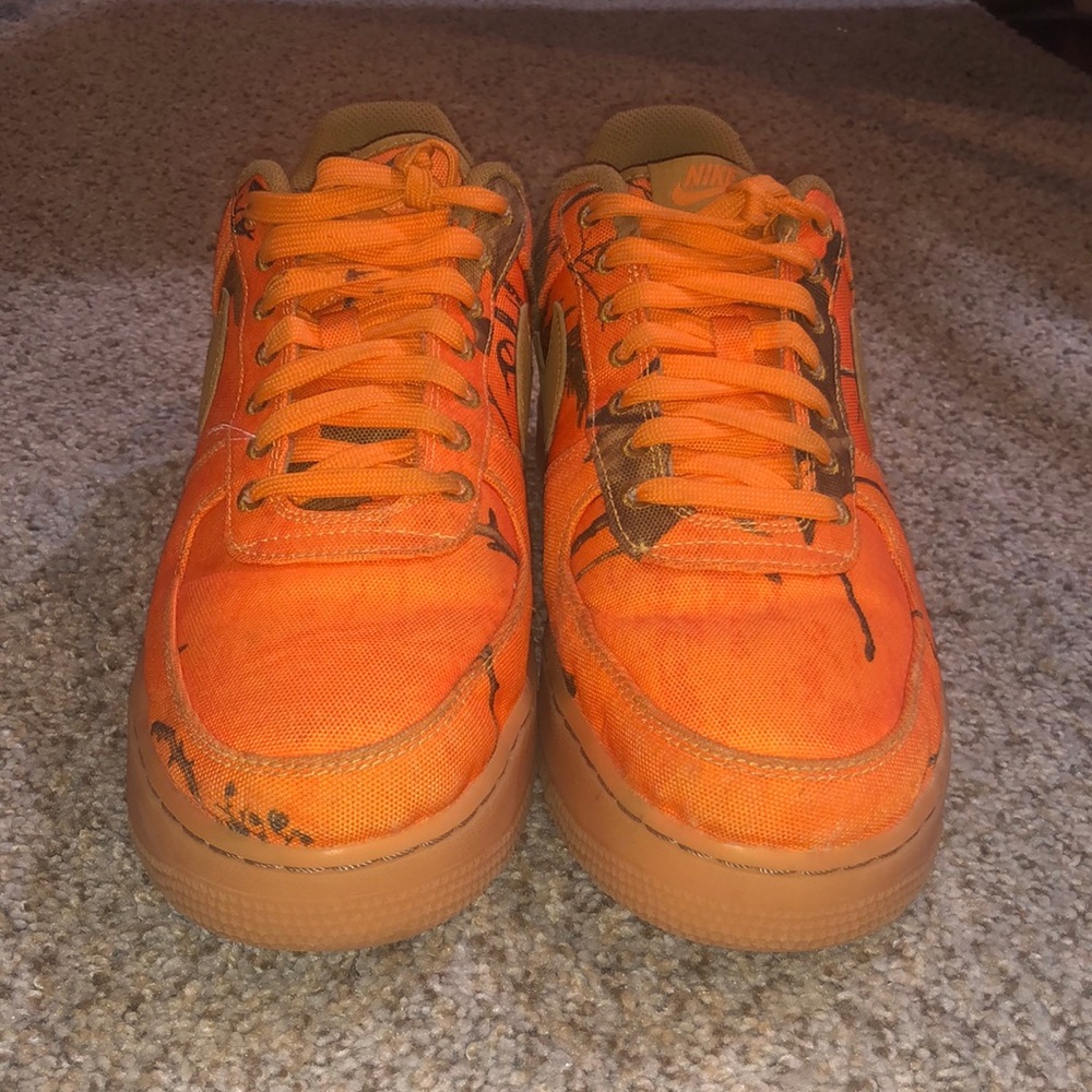 Men orange and tan camouflage sneakers